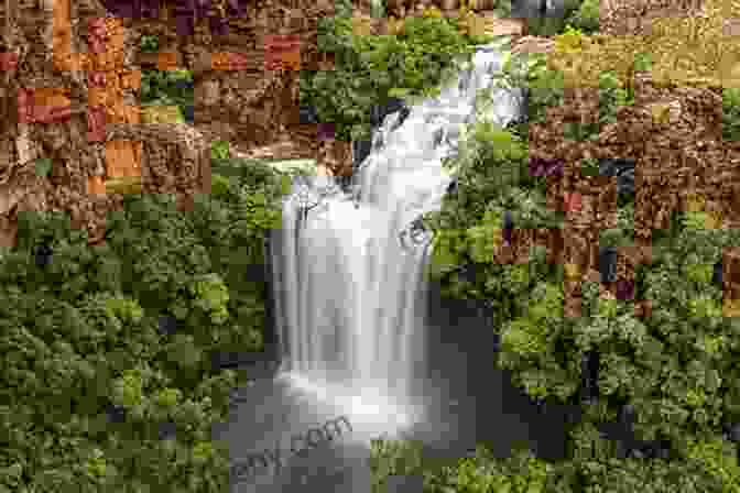 A Cascading Waterfall Plunges Into A Lush Rainforest In The Kimberley Region. Australia: A 4D (The Seven Continents)