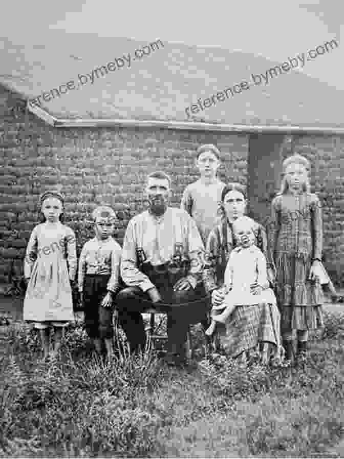 A Historical Photograph Of A Pioneer British American Family In Canada, Capturing Their Rugged Determination And Unwavering Optimism. Portraits Of British Americans (Canada) V1