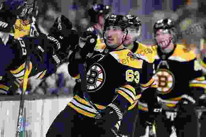 Boston Bruins Players Celebrating A Recent Playoff Victory Boston Bruins: Greatest Moments And Players