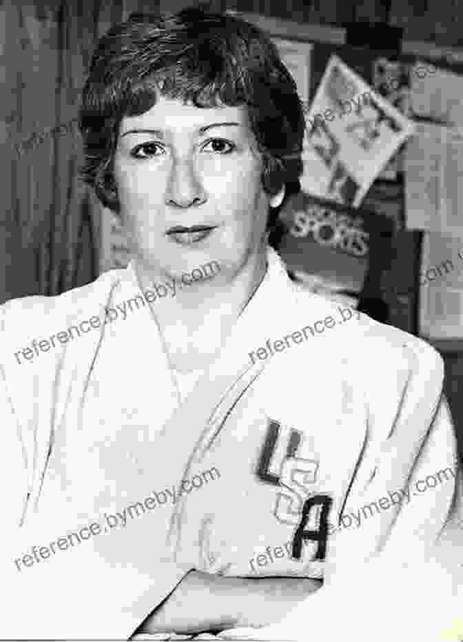 Rena Glickman Standing On The Podium With A Gold Medal Around Her Neck Rena Glickman Queen Of Judo