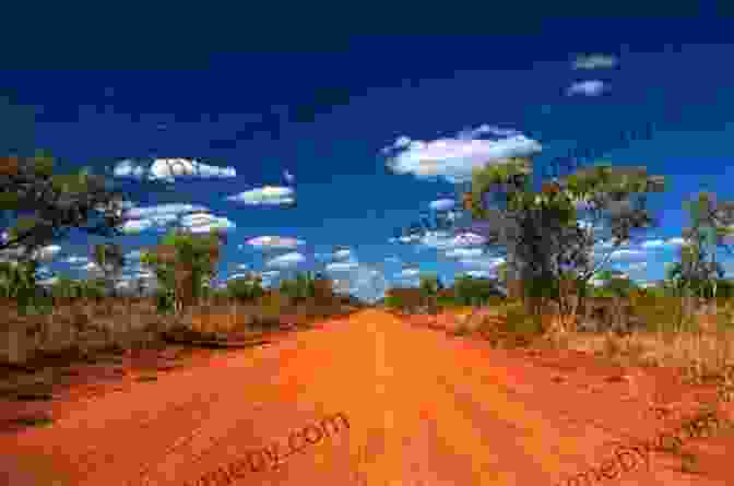 Stunning Sunrise Over The Vast, Red Earthed Australian Outback The Jacaranda Trail: A Journey Of Discovery Down Under (Travels Down Under 1)