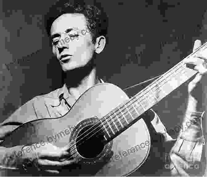 Woody Guthrie Playing Guitar On A Freight Train Bound For Glory (Plume) Woody Guthrie